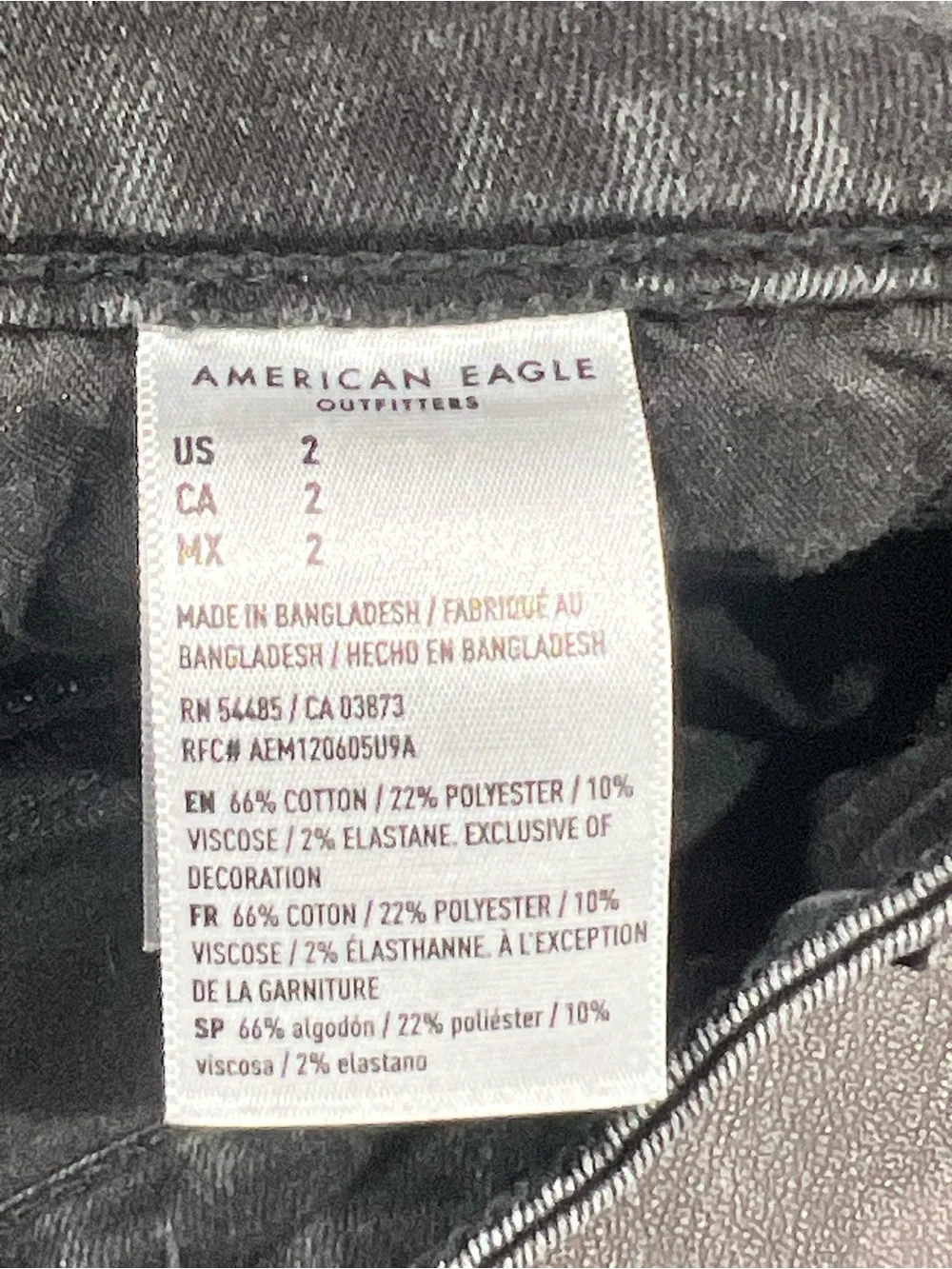 American Eagle Outfitters black denim shorts with button detail